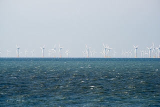 Wind Turbine Farm Several Miles Off Of The Coast