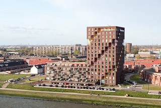 Unusual Buildings On River Leaving Rotterdam